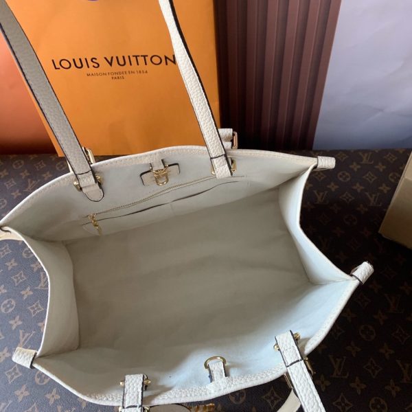 Louis Vuitton OnTheGo MM Monogram Empreinte Leather Handbag